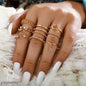 8-Piece Gold Plated Multi-Design Ring Set – White Crystal & Heart Detail Boho Stack
